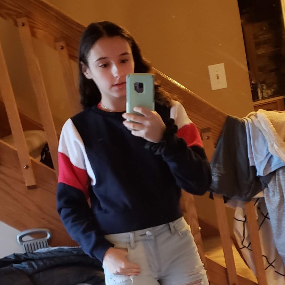Cropped Small navy colored garage sweatshirt with red + white stripes on sleeve